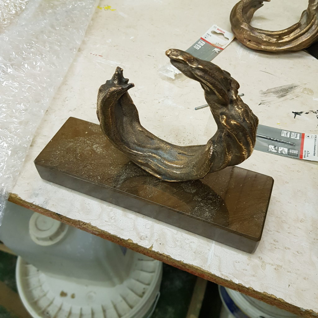 Sculpture en bronze sur socle en marbre