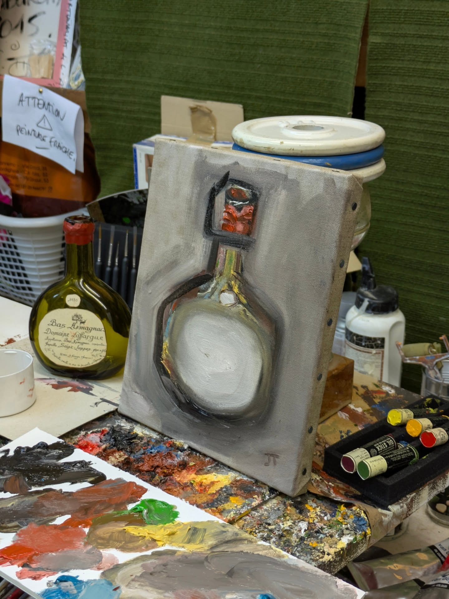 De beaux effets de lumière sur ce tableau représentant une bouteille d'Armagnac